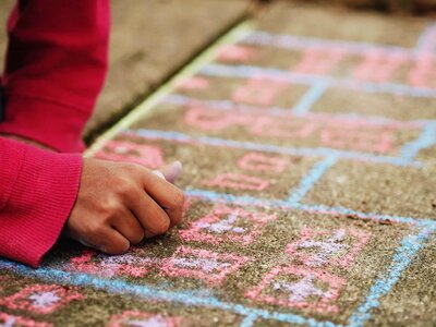 Asphalt chalk child