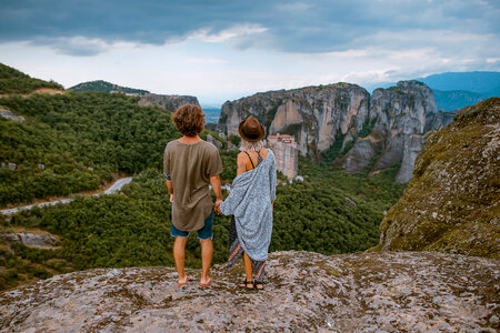 Couple Enjoying Outstanding View of Meteora Mountains, Greece photo