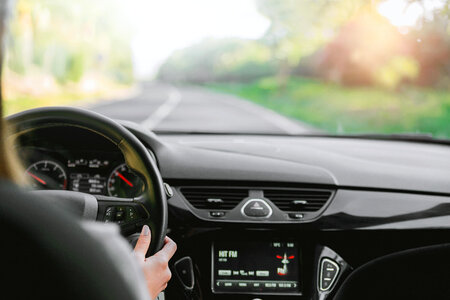 1 Young woman driving a car photo