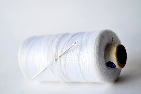 White Thread Needle