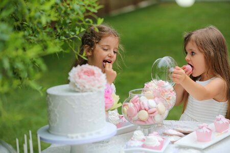 Eating girls birthday cake photo