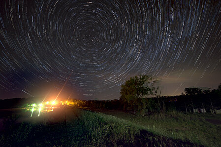 Star Trails over the house lights photo