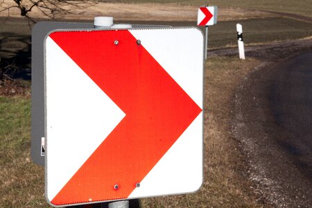 Risk traffic sign arrows photo
