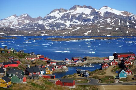 Wintertime with colorful houses in Tasiilaq, East Greenland photo