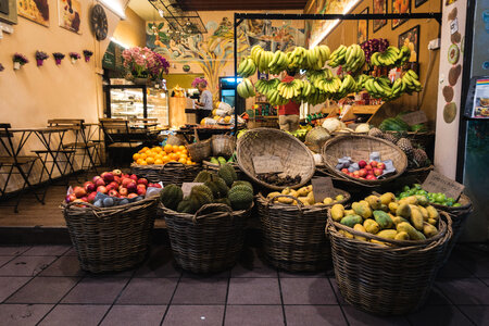 Exotic fruit store at night photo