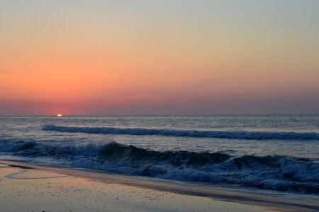 Sunset by the ocean and shoreline