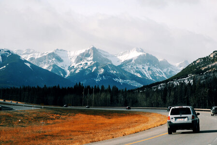 Driving on the road into the mountains in Banff National Park, Alberta, Canada photo