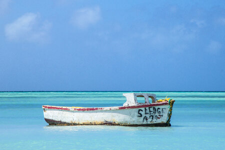 Turquoise Sea and Old Boat photo