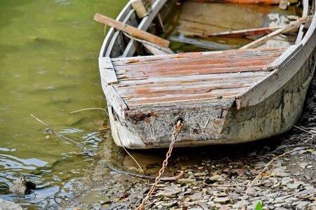 Riverbank boat abandoned photo