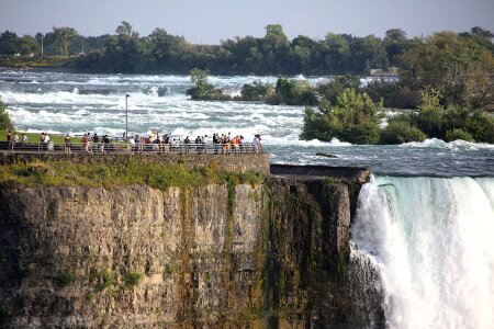 Visitors watch Horseshoe Fallsin Niagara Falls photo