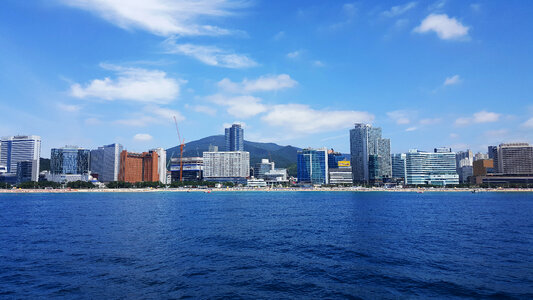 Skyline of Busan across the water in South Korea photo