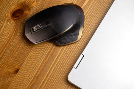 Mouse and Laptop on Desk photo