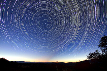 Star Trails in the Sky above the landscape
