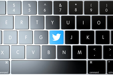 Twitter icon on laptop keyboard. Technology concept photo