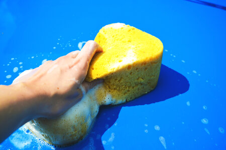 Washing Car with Sponge photo
