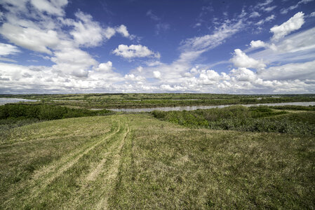 Hill and River under the Skies in Saskatchewan photo