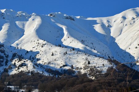 Mountains snow sun