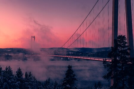 Foggy Bridge in Högakustenbron, Sweden photo