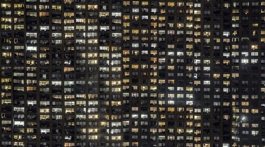 Apartment Building Windows Glowing photo