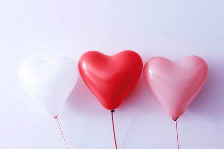 Three balloons in the shape of a heart. Beautiful Valentine’s Day photo