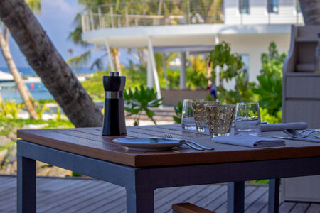 Breakfast Table Arrangement on a Tropical Beach photo