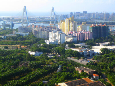 View of Haikou Century Bridge in the cityscape of Hainan photo