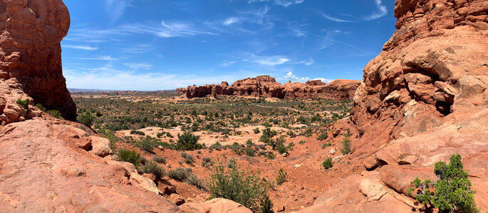Desert landscape sky, shrubs at Arches National Park photo