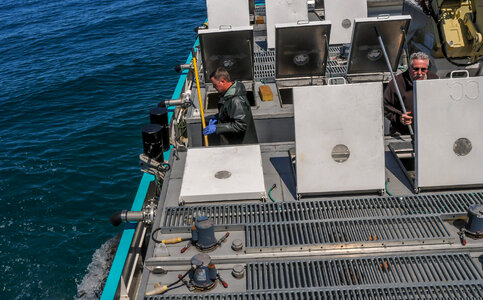 Fisheries worker aboard MV Spencer Baird-1