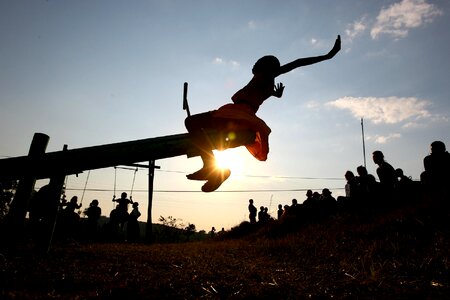 Female Child playground sunset