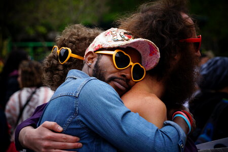 Hugged Guys with Heart-Shaped Glasses photo