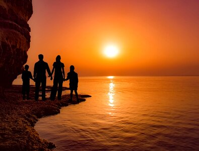Family Watching Sunset photo