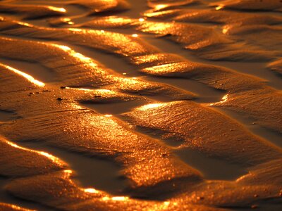 Beach sunset sand reflection