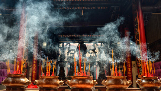 Incense burning at a temple in Hanoi, Vietnam photo