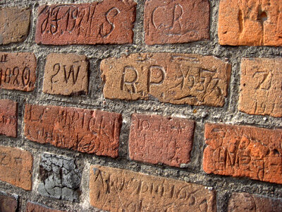 Inscriptions carved on the walls of St. Bartholomew's Church, Konin photo