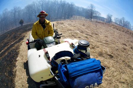 Service employee monitoring prescribed burn-7 photo