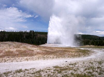 Old Faithful Geyser in Yellowstone National Park, Wyoming photo