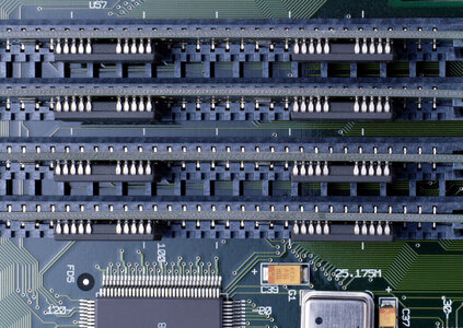 Memory Slots Close Up On Computer Motherboard photo