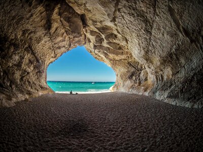 Beach cave hole photo