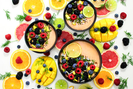 Colorful smoothies with fresh fruits photo
