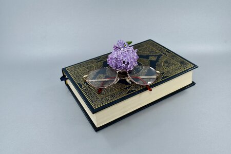 Book eyeglasses flower photo