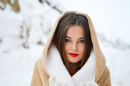Winter Portrait of Young Beautiful Brunette Woman photo