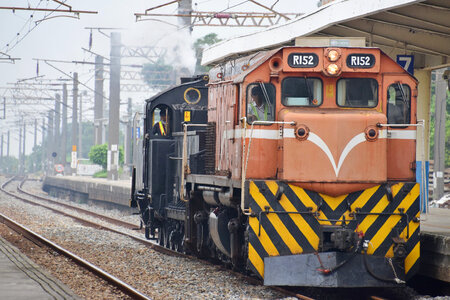 diesel train engine on tracks photo