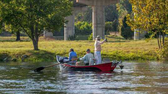 Group fly fishing from drift boat on White River-1 photo