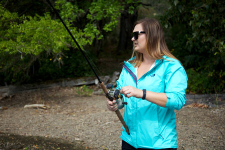 Young woman fishes for salmon-11 photo