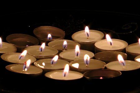 Burning tealight candles photo
