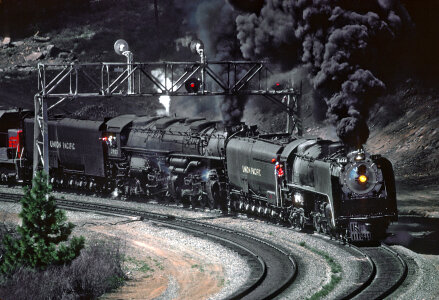 Steam Locomotive train with black smoke coming out photo