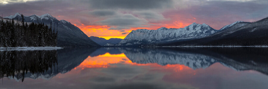 Sunset over the Apgar Mountains and lake in Glacier National Park, Montana photo
