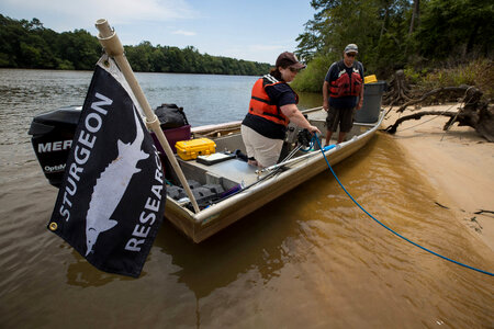 Biologists secure boat along shoreline-2