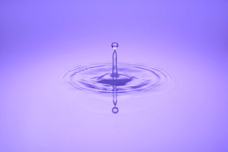 Wave purple drop of water