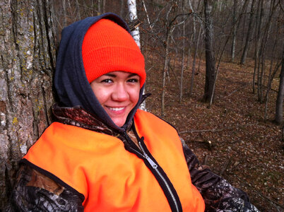 Youth deer hunter in treestand-2 photo